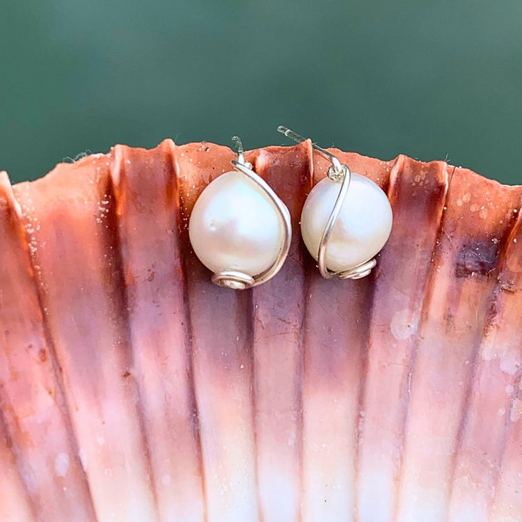 Ray of Sunshine Jewellery - Hand forged ear wires have a hand made swirl as my signature design, inspired by the Shiva shells found on our local beaches, crafted from hardened Sterling Silver to last daily wear. Your ears will love them!