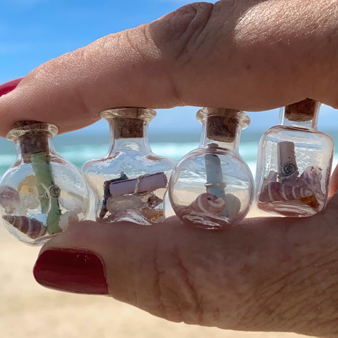 Ray of Sunshine Jewellery - a teeny glass jar filled with crystals, gemstones, shells and a note wrapped in Sterling Silver for you to enjoy!