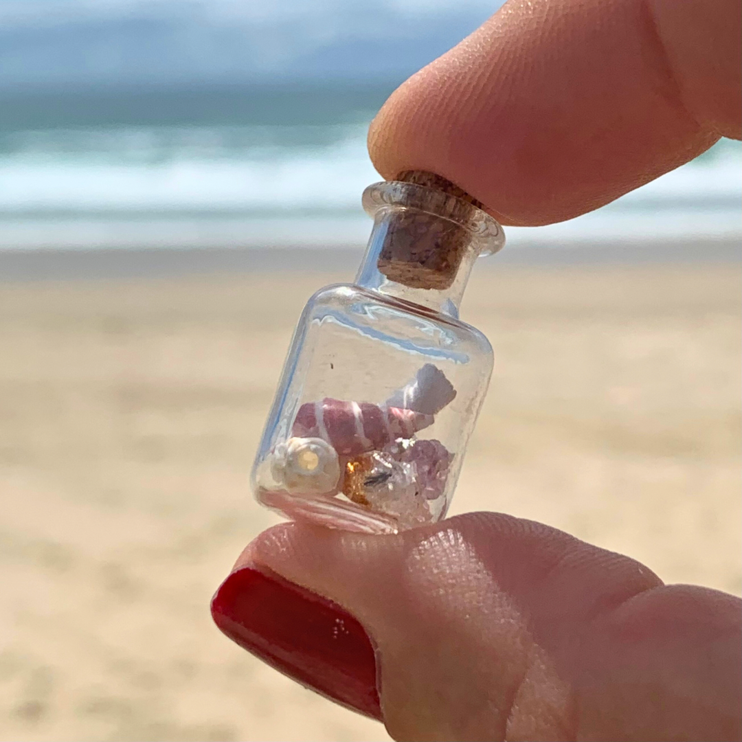 Ray of Sunshine Jewellery - a teeny glass jar filled with crystals, gemstones, shells and a note wrapped in Sterling Silver for you to enjoy!