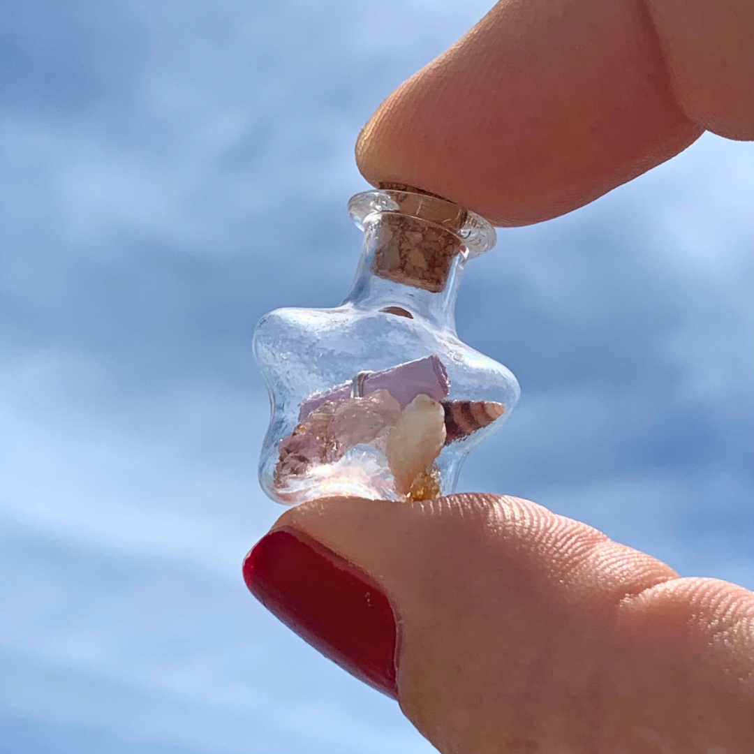 Ray of Sunshine Jewellery - a teeny glass jar filled with crystals, gemstones, shells and a note wrapped in Sterling Silver for you to enjoy!