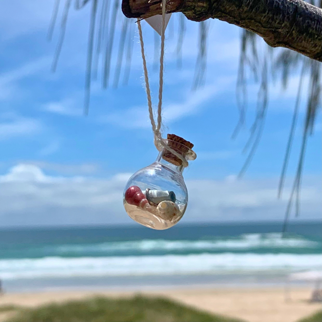 Ray of Sunshine Jewellery - a teeny glass jar filled with crystals, gemstones, shells and a note wrapped in Sterling Silver for you to enjoy!