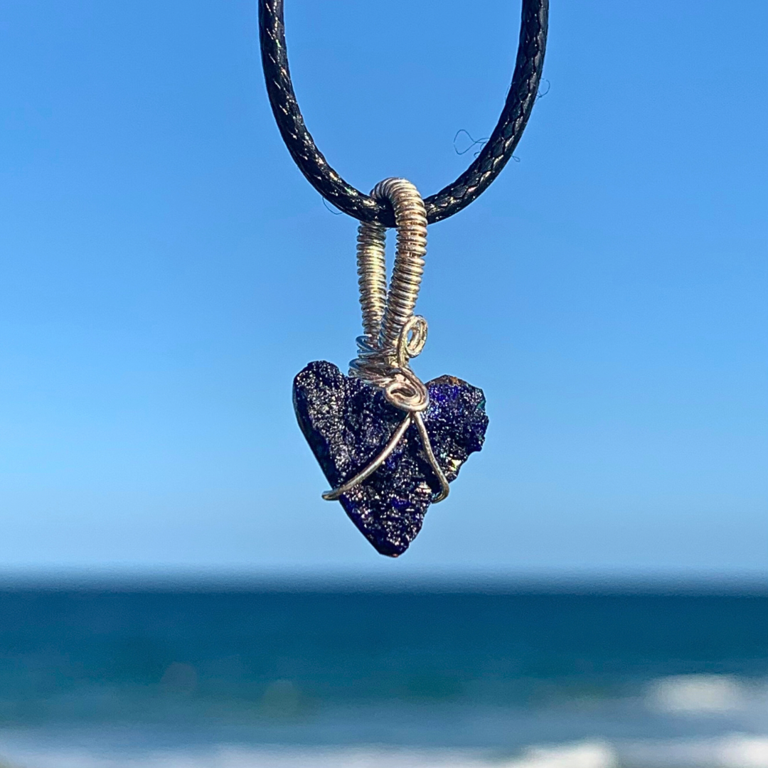 Ray of Sunshine Jewellery this quaint heart shaped stone has tiny druzy crystals that shimmer in the sunshine. Wrapped in sterling silver and hanging over the ocean in the sunshine