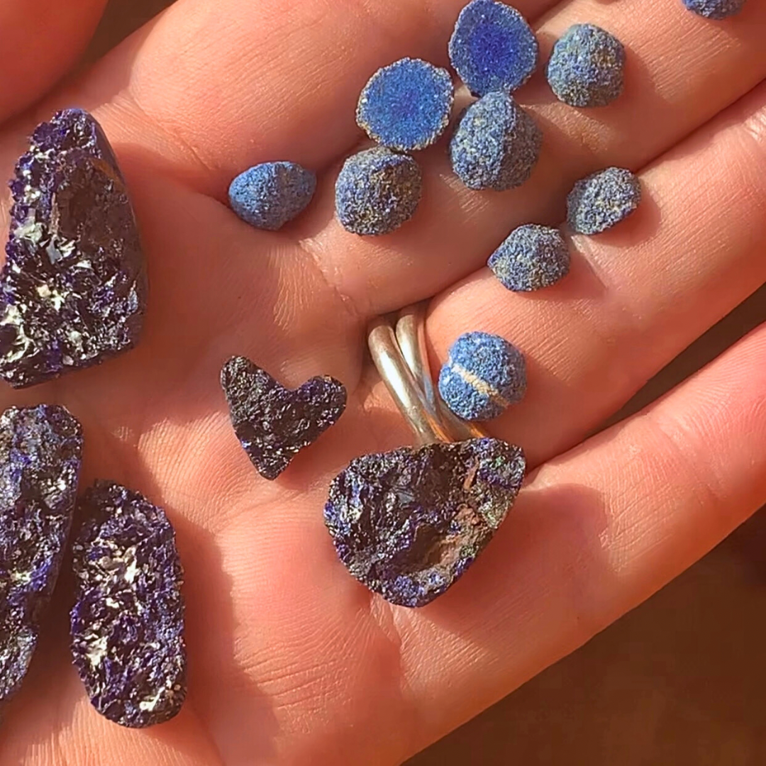 Ray of Sunshine Jewellery a selection of my hand cut stones in the palm of my hand and all sparkly in the sunshine