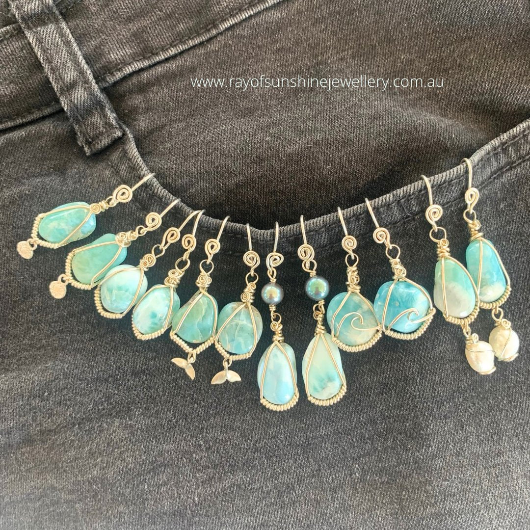 Ray of Sunshine Jewellery - Hand forged ear wires have a hand made swirl as my signature design, inspired by the Shiva shells found on our local beaches, crafted from hardened Sterling Silver to last daily wear.  Your ears will love them!