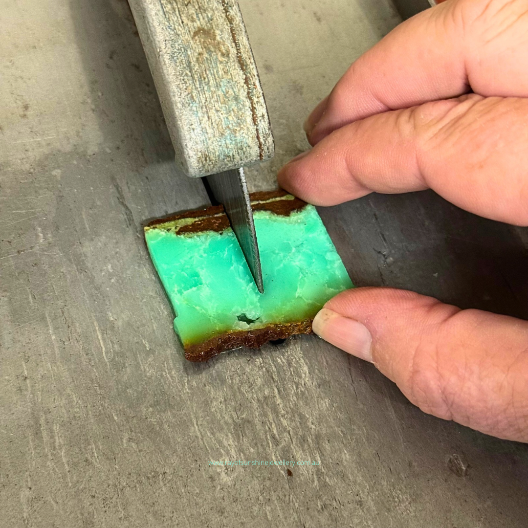 Ray of Sunshine Jewellery- me cutting some Apple-Greeb Chrysoprase on a trim saw.