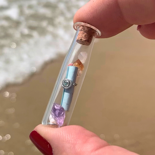 Ray of Sunshine Jewellery - a teeny glass jar filled with crystals, gemstones, shells and a note wrapped in Sterling Silver for you to enjoy!
