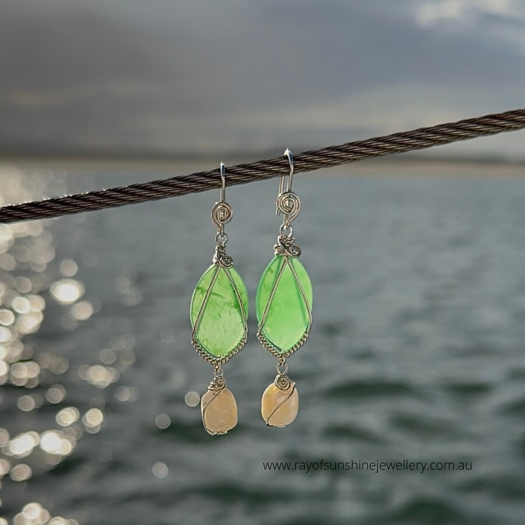 Ray of Sunshine Jewellery- Apple-Green Chrysoprase earrings with silver hooks on a blurred water background