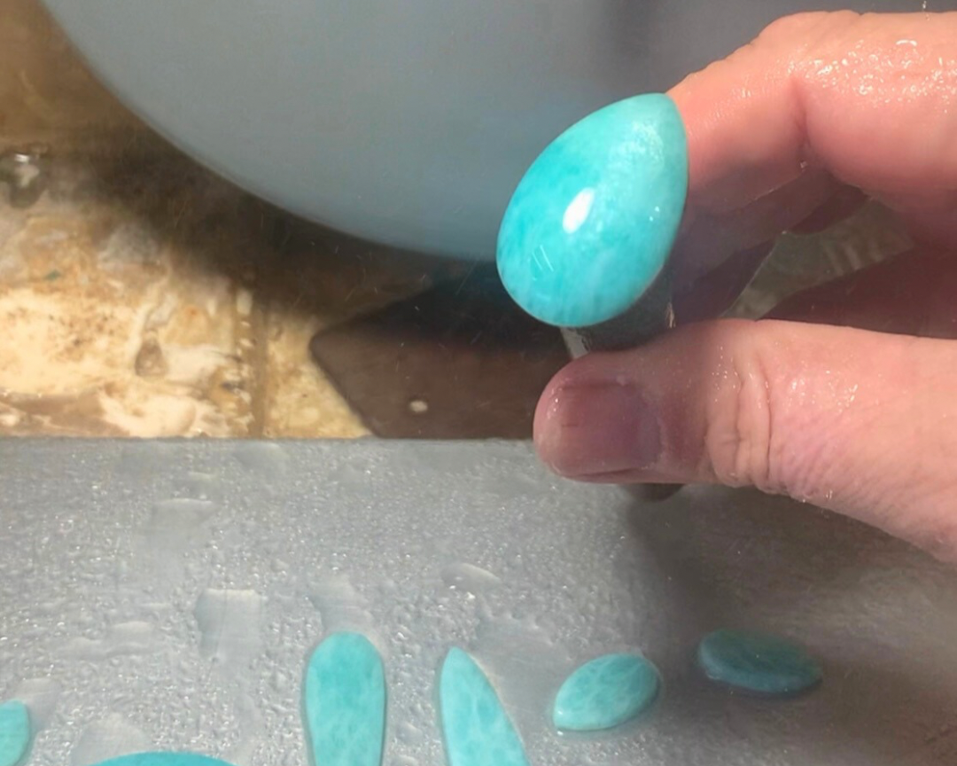 Ray of Sunshine Jewellery- hand cutting this gorgeous stone on a dop stick on 1200 grit diamond pads 