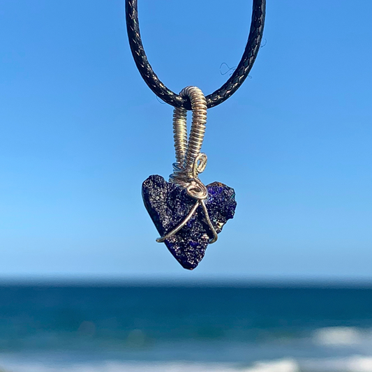 Ray of Sunshine Jewellery this quaint heart shaped stone has tiny druzy crystals that shimmer in the sunshine. Wrapped in sterling silver and hanging over the ocean in the sunshine